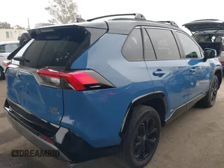 2023 Toyota RAV4 Hybrid XSE with VIN 2T3E6RFV4PW039496, listed as a IAAI auction lot 42488695 with 13,533 mi miles and . Bid and sale history available at DreamBid. Image 4.