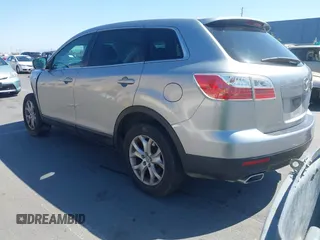 2011 Mazda CX-9 Sport with VIN JM3TB2BVXB0307360, listed as a IAAI auction lot 42580629 with 136,928 mi miles and . Bid and sale history available at DreamBid. Image 3.