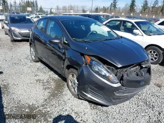 2019 Ford Fiesta SE with VIN 3FADP4EJ3KM140068, listed as a IAAI auction lot 41826466 with 64,277 mi miles. Bid and sale history available at carsss.com. Image 1.