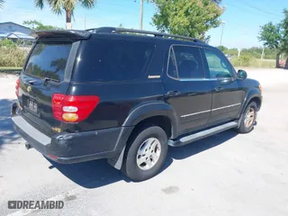 2002 Toyota Sequoia Limited with VIN 5TDZT38AX2S091954, listed as a IAAI auction lot 42035632 with 206,969 mi miles. Bid and sale history available at carsss.com. Image 4.