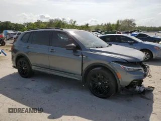 2022 Volkswagen Tiguan SE R-Line Black with VIN 3VVCB7AX6NM081880, listed as a Copart auction lot 54102735 with 52,010 mi miles and Salvage Title. Bid and sale history available at DreamBid. Image 4.