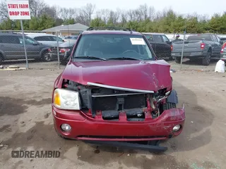 2007 GMC Envoy SLE z VIN 1GKDT13SX72238484, wystawiony jako IAAI lot #41909659 z przebiegiem 97 327 mil mil oraz . Historia ofert i sprzedaży dostępna na DreamBid. Obrazek 13.
