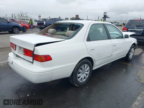 2001 Toyota Camry CE with VIN JT2BG22K110603452, listed as a IAAI auction lot 41731258 with 117,142 mi miles. Bid and sale history available at carsss.com. Image 4.
