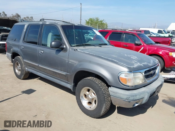 1999 Ford Explorer XLT z VIN 1FMZU32E8XUA34921, wystawiony jako IAAI lot #42162432 z przebiegiem 263 443 mil mil oraz . Historia ofert i sprzedaży dostępna na DreamBid. Obrazek 1.