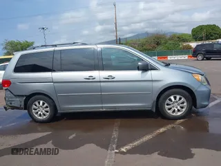 2010 Honda Odyssey EX-L with VIN 5FNRL3H6XAB061092, listed as a IAAI auction lot 41645143 with 165,941 mi miles. Bid and sale history available at carsss.com. Image 14.