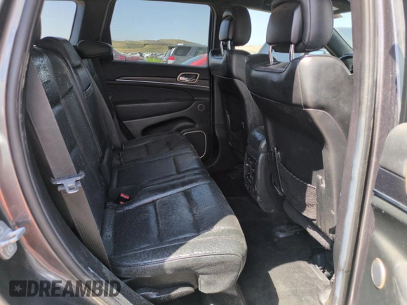 2014 Jeep Grand Cherokee Summit with VIN 1C4RJFJM8EC395169, listed as a Copart auction lot 60637265 with 116,575 mi miles and Salvage title. Bid and sale history available at DreamBid. Image 10.
