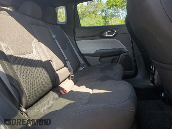 2023 Jeep Compass Sport with VIN 3C4NJDAN0PT572204, listed as a Copart auction lot 52490095 with 8,284 mi miles and Salvage title. Bid and sale history available at DreamBid. Image 11.
