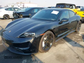 2022 Porsche Taycan z VIN WP0AA2Y10NSA11640, wystawiony jako IAAI lot #41215410 z przebiegiem 25 749 mil mil oraz . Historia ofert i sprzedaży dostępna na DreamBid. Obrazek 6.