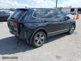 2021 Volkswagen Tiguan SE with VIN 3VV2B7AX1MM150534, listed as a IAAI auction lot 41814162 with 49,079 mi miles. Bid and sale history available at carsss.com. Image 4.