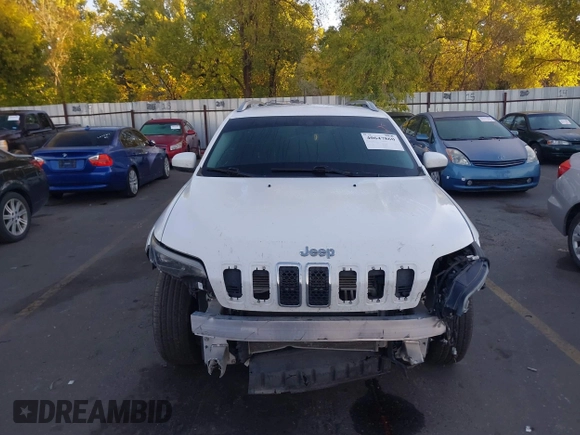 2019 Jeep Cherokee Latitude with VIN 1C4PJMCX0KD104155, listed as a IAAI auction lot 40647860 with 125,802 mi miles. Bid and sale history available at carsss.com. Image 6.