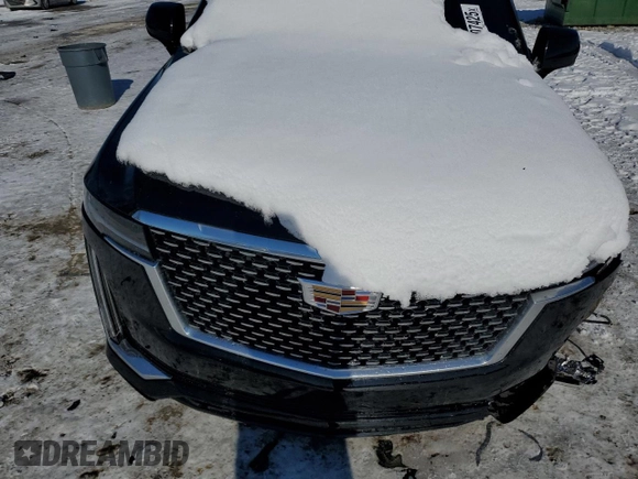 2021 Cadillac Escalade Premium Luxury z VIN 1GYS4CKL6MR486671, wystawiony jako Copart lot #89207425 z przebiegiem Nie podano mil oraz Szkoda całkowita • Salvage title. Historia ofert i sprzedaży dostępna na DreamBid. Obrazek 13.