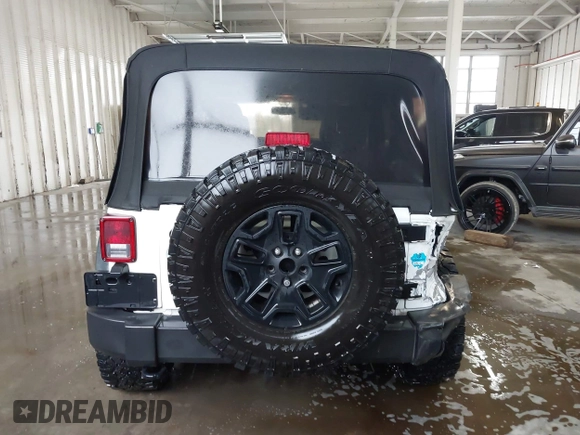 2016 Jeep Wrangler Unlimited Rubicon with VIN 1C4HJWFG4GL127379, listed as a IAAI auction lot 41732688 with 110,193 mi miles. Bid and sale history available at carsss.com. Image 16.