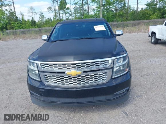 2015 Chevrolet Tahoe LT with VIN 1GNSCBKC1FR615817, listed as a IAAI auction lot 41760474 with 242,148 mi miles and . Bid and sale history available at DreamBid. Image 12.