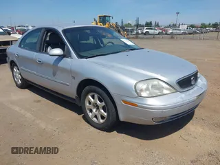 2000 Mercury Sable LS Premium z VIN 1MEFM55S6YA629840, wystawiony jako IAAI lot #42367547 z przebiegiem 250 777 mil mil oraz . Historia ofert i sprzedaży dostępna na DreamBid. Obrazek 1.