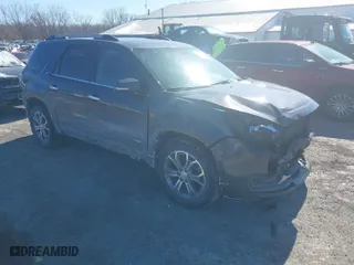 2014 GMC Acadia SLT with VIN 1GKKVRKDXEJ284385, listed as a IAAI auction lot 41622670 with 220,405 mi miles. Bid and sale history available at carsss.com. Image 1.