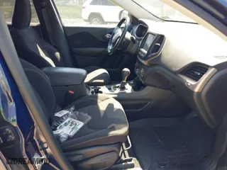2016 Jeep Cherokee Latitude with VIN 1C4PJMCB1GW131963, listed as a IAAI auction lot 42065593 with 129,748 mi miles. Bid and sale history available at carsss.com. Image 5.