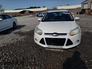2012 Ford Focus SE with VIN 1FAHP3F27CL182474, listed as a Copart auction lot 51451595 with 122,199 mi miles and Salvage Title. Bid and sale history available at DreamBid. Image 13.