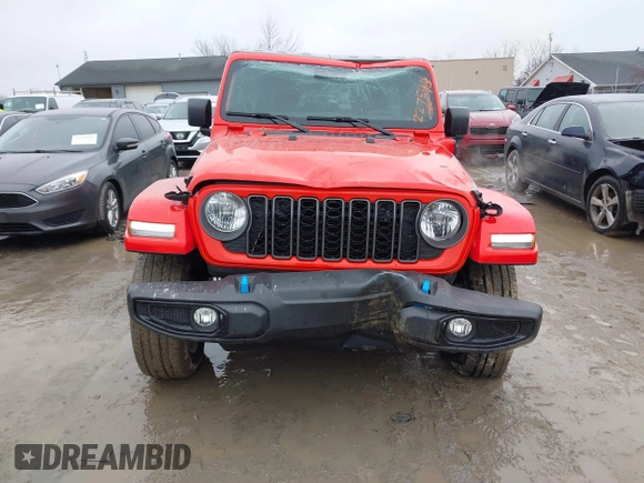 2024 Jeep Wrangler Willys z VIN 1C4RJXN67RW227593, wystawiony jako IAAI lot #41519596 z przebiegiem 7 851 mil mil oraz . Historia ofert i sprzedaży dostępna na DreamBid. Obrazek 12.