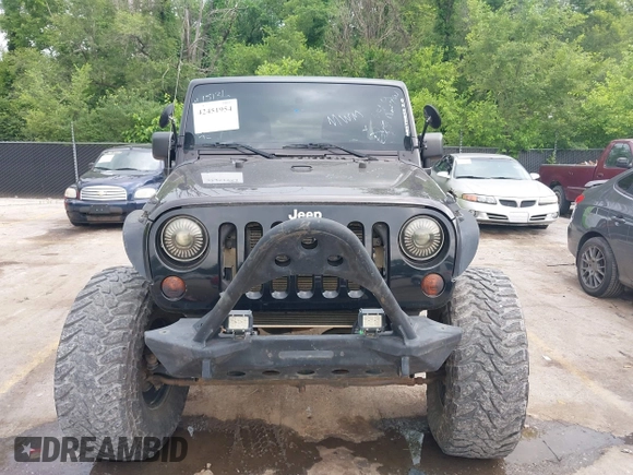 2013 Jeep Wrangler Unlimited Rubicon with VIN 1C4BJWFG5DL652050, listed as a IAAI auction lot 42451954 with 107,110 mi miles and . Bid and sale history available at DreamBid. Image 12.