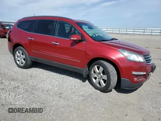 2014 Chevrolet Traverse LTZ z VIN 1GNKVJKD8EJ324323, wystawiony jako Copart lot #51430325 z przebiegiem 141 209 mil mil oraz Szkoda całkowita • Salvage title. Historia ofert i sprzedaży dostępna na DreamBid. Obrazek 4.