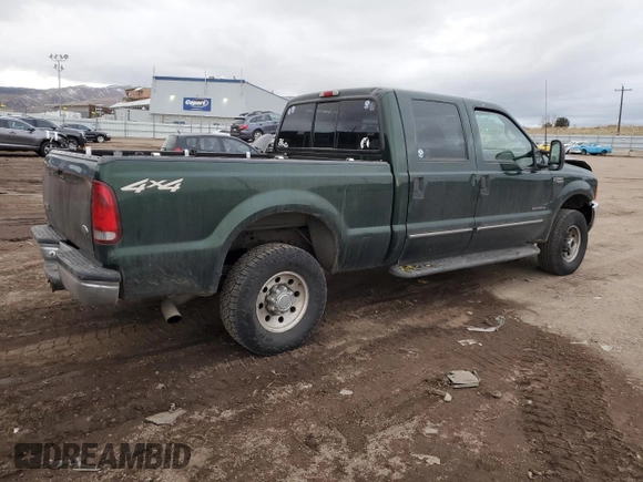 2000 Ford F-250 XL with VIN 1FTNW21F5YEB21513, listed as a Copart auction lot 82013464 with 383,819 mi miles and Salvage title. Bid and sale history available at DreamBid. Image 3.