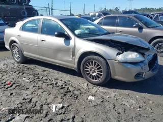 2004 Chrysler Sebring LX with VIN 1C3EL46X74N148104, listed as a IAAI auction lot 41635081 with 60,674 mi miles and . Bid and sale history available at DreamBid. Image 1.