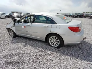 2010 Chrysler Sebring Limited with VIN 1C3CC5FDXAN162044, listed as a Copart auction lot 56789075 with Not provided miles and Non repairable. Bid and sale history available at DreamBid. Image 2.