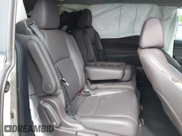 2018 Honda Odyssey EX-L with VIN 5FNRL6H77JB047919, listed as a IAAI auction lot 42112505 with 108,706 mi miles and . Bid and sale history available at DreamBid. Image 8.
