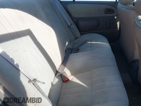 1997 Toyota Corolla with VIN 1NXBA02E5VZ595972, listed as a IAAI auction lot 41622050 with 143,577 mi miles and . Bid and sale history available at DreamBid. Image 8.
