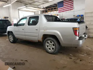 2006 Honda Ridgeline RTL with VIN 2HJYK16526H513871, listed as a Copart auction lot 61567884 with 267,601 mi miles and Clean Title. Bid and sale history available at carsss.com. Image 2.
