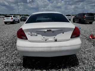 2003 Ford Taurus SES Standard z VIN 1FAFP55U93A162213, wystawiony jako Copart lot #54657645 z przebiegiem 43 756 mil mil oraz Szkoda całkowita • Salvage title. Historia ofert i sprzedaży dostępna na DreamBid. Obrazek 6.