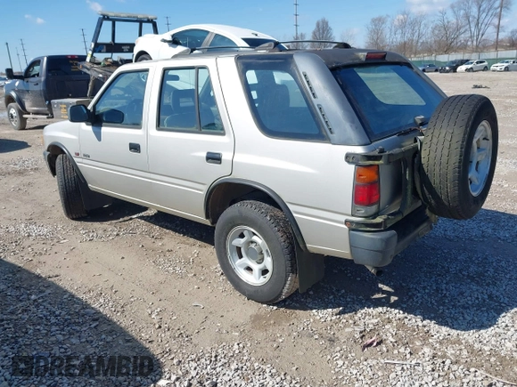 1995 Isuzu Rodeo z VIN 4S2CM58V4S4363500, wystawiony jako IAAI lot #41821801 z przebiegiem 94 480 mil mil oraz . Historia ofert i sprzedaży dostępna na DreamBid. Obrazek 3.