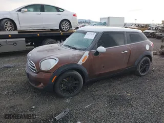 2014 MINI Cooper Paceman with VIN WMWSS1C58EWN94368, listed as a IAAI auction lot 41377194 with 56897 miles. Bid and sale history available at carsss.com. Image 17.