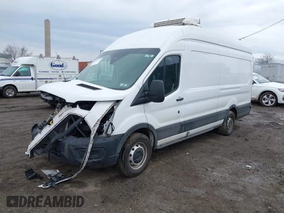 2022 Ford Transit Cargo with VIN 1FTBW3X83NKA44302, listed as a IAAI auction lot 41684165 with 33,463 mi miles and . Bid and sale history available at DreamBid. Image 2.