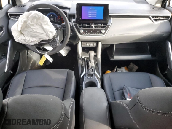 2023 Toyota Corolla Cross XLE with VIN 7MUDAABG6PV078570, listed as a Copart auction lot 65246535 with 21,928 mi miles and Salvage title. Bid and sale history available at DreamBid. Image 8.