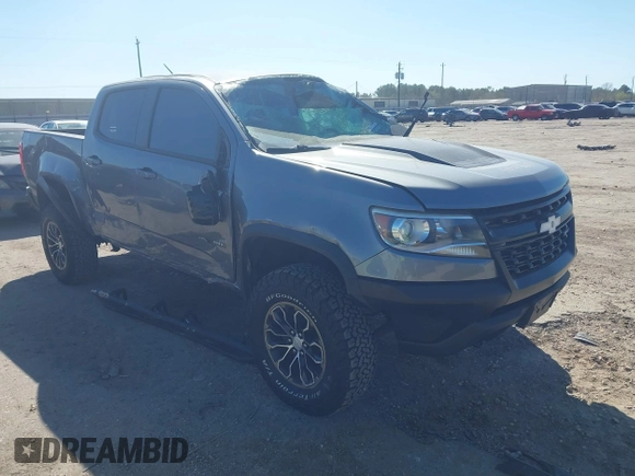 2018 Chevrolet Colorado 4WD ZR2 z VIN 1GCGTEEN0J1115894, wystawiony jako IAAI lot #41774860 z przebiegiem 71 698 mil mil oraz . Historia ofert i sprzedaży dostępna na DreamBid. Obrazek 1.