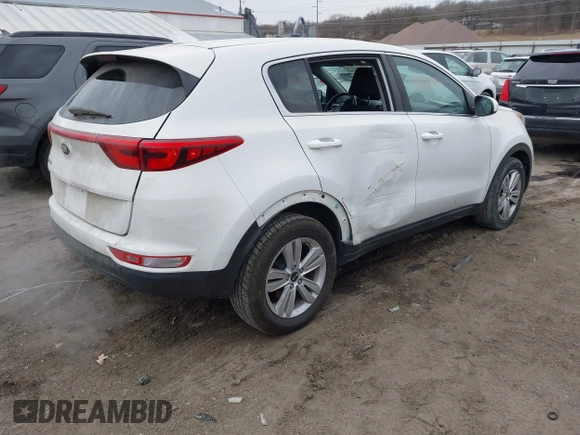 2018 Kia Sportage LX with VIN KNDPM3AC4J7315826, listed as a IAAI auction lot 41521362 with 130,628 mi miles and . Bid and sale history available at DreamBid. Image 4.