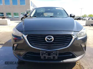 2016 Mazda CX-3 Sport z VIN JM1DKBB72G0106476, wystawiony jako Copart lot #56236245 z przebiegiem 161 207 mil mil oraz Szkody całkowita. Historia ofert i sprzedaży dostępna na DreamBid. Obrazek 5.