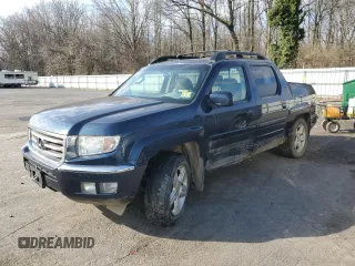 2012 Honda Ridgeline RTL z VIN 5FPYK1F51CB455815, wystawiony jako Copart lot #50969885 z przebiegiem Nie podano mil oraz Szkoda całkowita • Salvage title. Historia ofert i sprzedaży dostępna na DreamBid. Obrazek 1.
