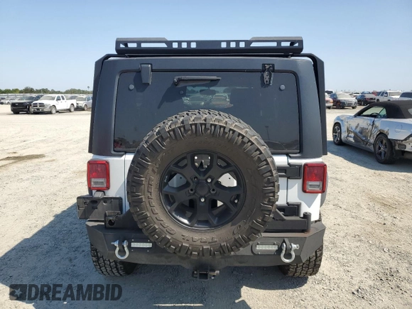2014 Jeep Wrangler Unlimited Rubicon with VIN 1C4BJWFG0EL201559, listed as a Copart auction lot 59580575 with 182,101 mi miles and Salvage title. Bid and sale history available at DreamBid. Image 6.