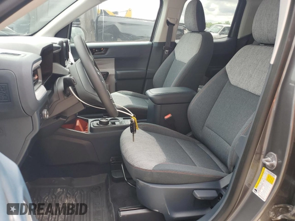 2023 Ford Maverick XL with VIN 3FTTW8E93PRA57918, listed as a Copart auction lot 55580585 with 2,013 mi miles and Salvage Title. Bid and sale history available at DreamBid. Image 7.