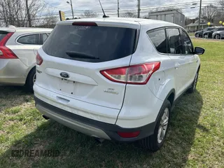 2016 Ford Escape SE with VIN 1FMCU0GX8GUA72471, listed as a IAAI auction lot 41737000 with 106,820 mi miles. Bid and sale history available at carsss.com. Image 4.