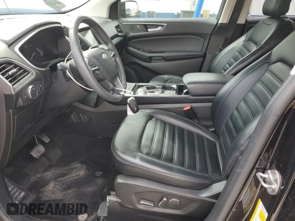 2019 Ford Edge SEL z VIN 2FMPK3J99KBB21856, wystawiony jako Copart lot #53104645 z przebiegiem 98 419 mil mil oraz Szkoda całkowita • Salvage title. Historia ofert i sprzedaży dostępna na DreamBid. Obrazek 7.