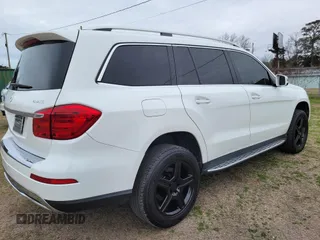 2015 Mercedes-Benz GL-Class GL 450 with VIN 4JGDF6EE2FA517080, listed as a IAAI auction lot 41640032 with 136,625 mi miles. Bid and sale history available at carsss.com. Image 3.