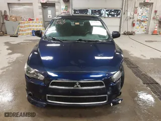2013 Mitsubishi Lancer SE with VIN JA32V2FW9DU005616, listed as a IAAI auction lot 41247087 with 129,055 mi miles. Bid and sale history available at carsss.com. Image 12.
