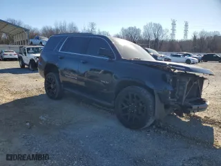 2019 Chevrolet Tahoe LT with VIN 1GNSCBKC5KR353908, listed as a Copart auction lot 41826985 with 97,949 mi miles and Clean Title. Bid and sale history available at carsss.com. Image 4.