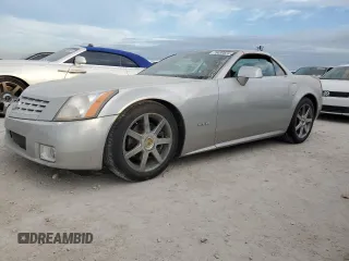 2004 Cadillac XLR z VIN 1G6YV34A045603308, wystawiony jako Copart lot #75459524 z przebiegiem Nie podano mil oraz Szkody całkowita. Historia ofert i sprzedaży dostępna na DreamBid. Obrazek 1.