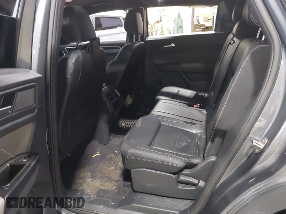2021 Volkswagen Atlas SEL z VIN 1V2BE2CA6MC203777, wystawiony jako IAAI lot #42507511 z przebiegiem 76 358 mil mil oraz . Historia ofert i sprzedaży dostępna na DreamBid. Obrazek 8.