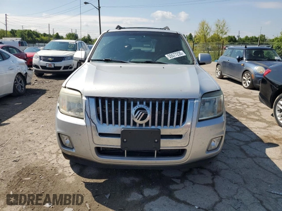 2009 Mercury Mariner Premier z VIN 4M2CU87769KJ11358, wystawiony jako Copart lot #55577235 z przebiegiem 206 627 mil mil oraz Szkody całkowita. Historia ofert i sprzedaży dostępna na DreamBid. Obrazek 5.