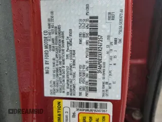 2015 Ford Fusion Titanium Hybrid with VIN 3FA6P0RUXFR247357, listed as a Copart auction lot 55943975 with 112,278 mi miles and Salvage title. Bid and sale history available at DreamBid. Image 12.